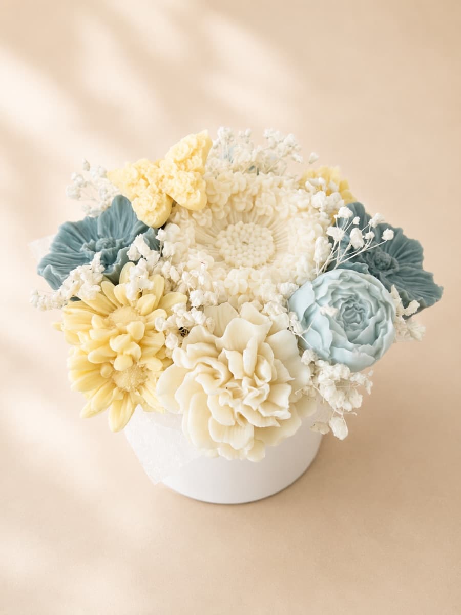 Bouquet en cire jaune pâle et bleu canard